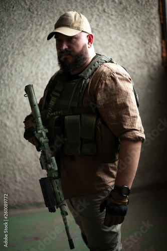 Armed soldier ready for battle. Military concept.