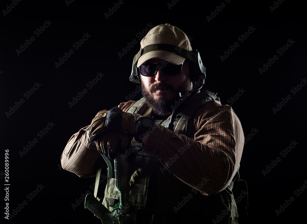 Armed soldier ready for battle. Military concept. Armed soldier ready for battle. Military concept.