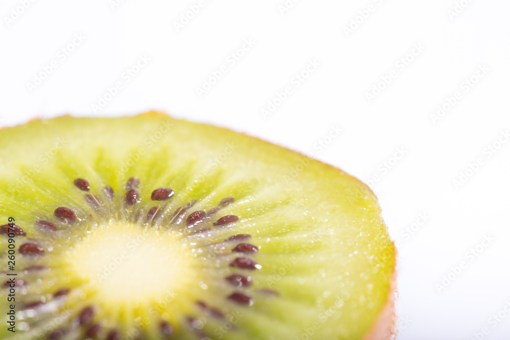 Close up detail of green fresh kiwi fruit on white background Close up detail of green fresh kiwi fruit on white background