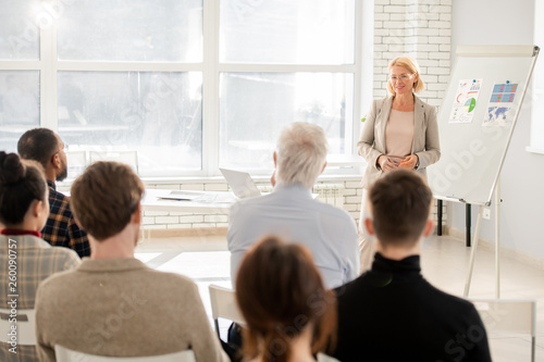 Teacher in front of audience