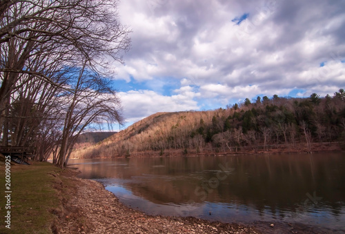 The Allegheny River valley in Warren County, Pennsylvania, USA in springtime under vibrant skies