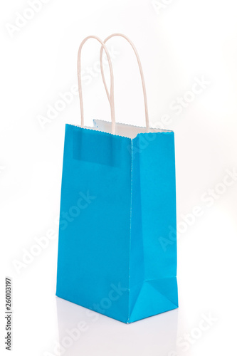 Cyan paper bags isolated on white background