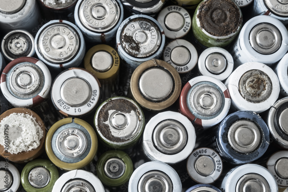 Group of used disposable drain batteries of various size Group of used disposable drain batteries of various size