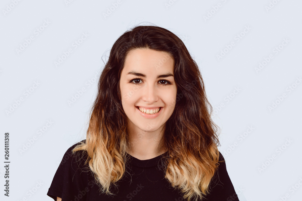 Portrait of young latin woman in a studio. Portrait of young latin woman in a studio.