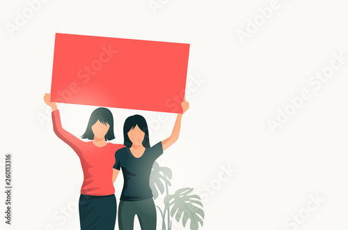 Two Women Holding Up a Blank Sign