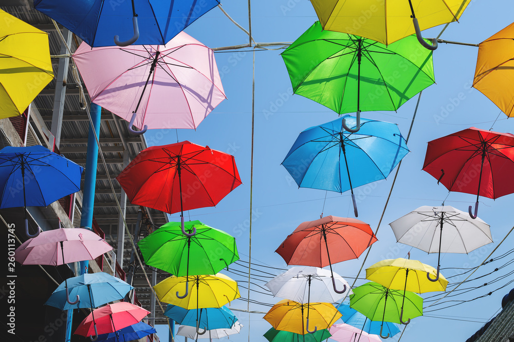 colored umbrellas in the sky