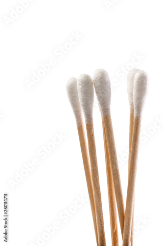 Eco-friendly materials. Wooden, cotton swabs on a white background.