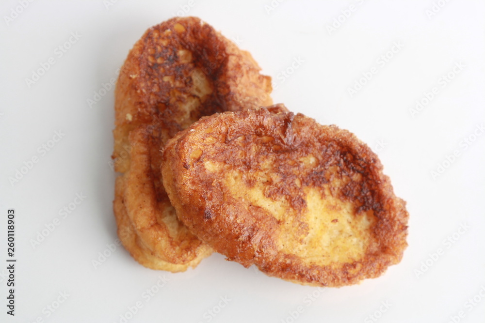 The torrijas are a typical Spanish dessert that is eaten for Easter, are made with milk and bread The torrijas are a typical Spanish dessert that is eaten for Easter, are made with milk and bread