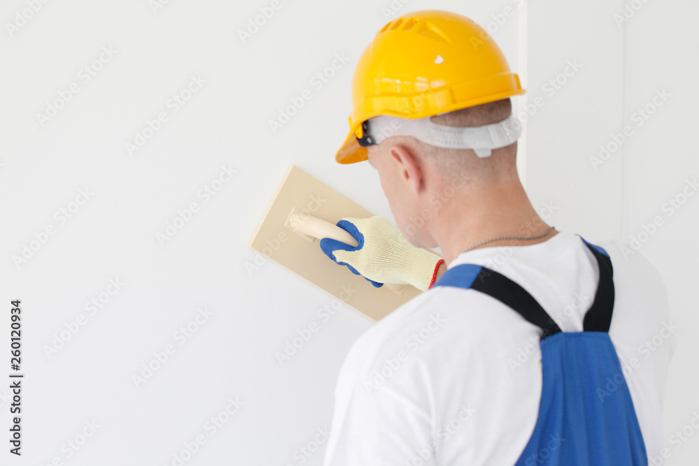 Worker aligns with sandpaper Worker aligns with sandpaper