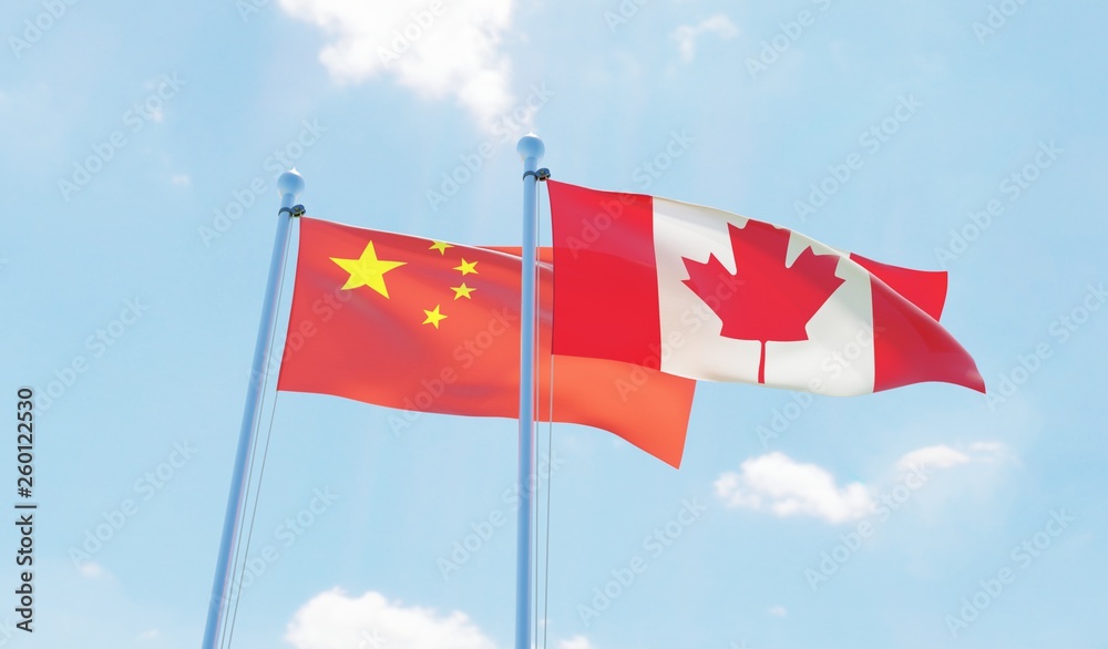 Canada and China, two flags waving against blue sky. 3d image