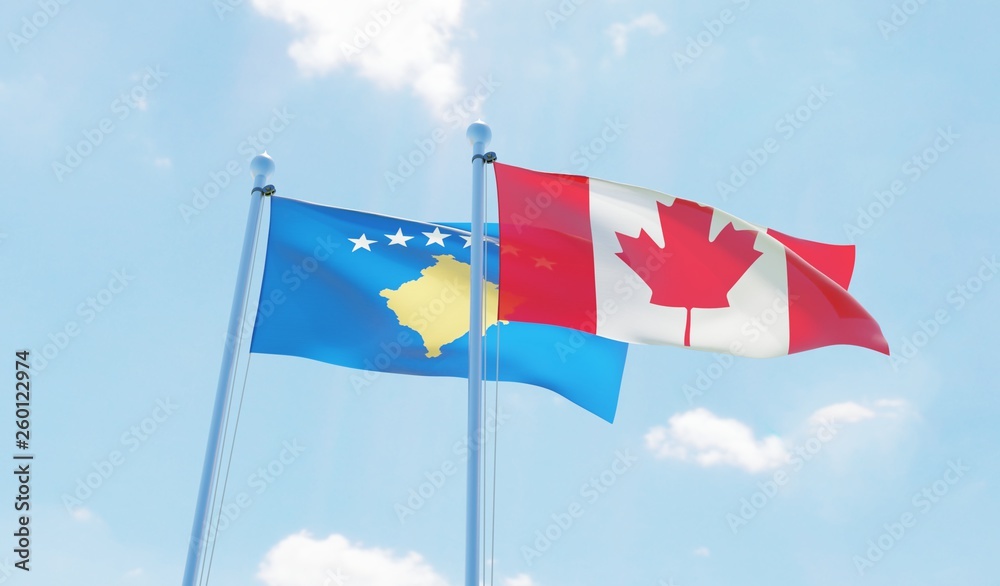 Canada and Kosovo, two flags waving against blue sky. 3d image
