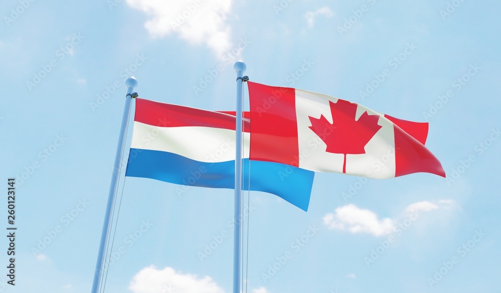 Canada and Netherlands, two flags waving against blue sky. 3d image