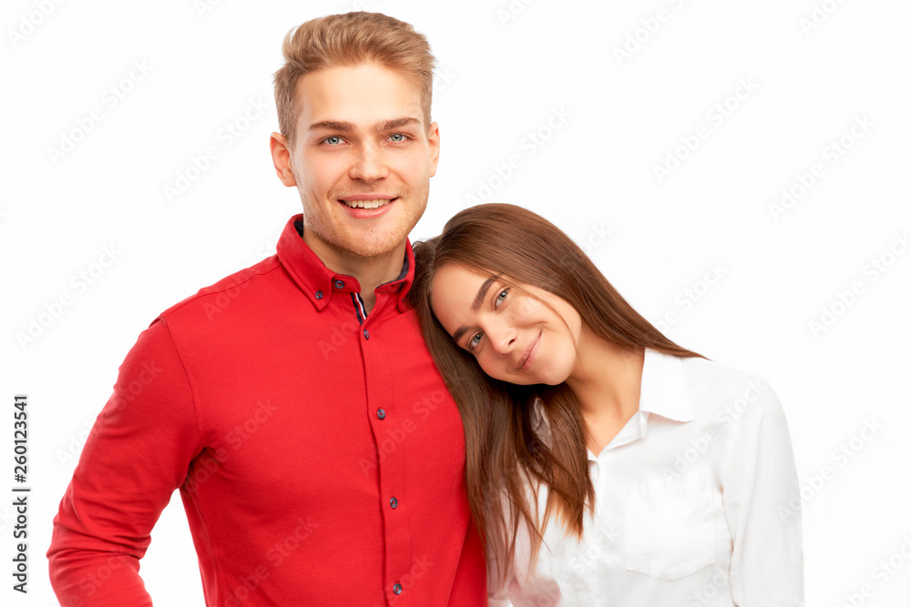 Happy young couple, beautiful girl lying on her boyfriend's shoulder. Love, tenderness, romance, relationships and happiness concept. Happy young couple, beautiful girl lying on her boyfriend's shoulder. Love, tenderness, romance, relationships and happiness concept.