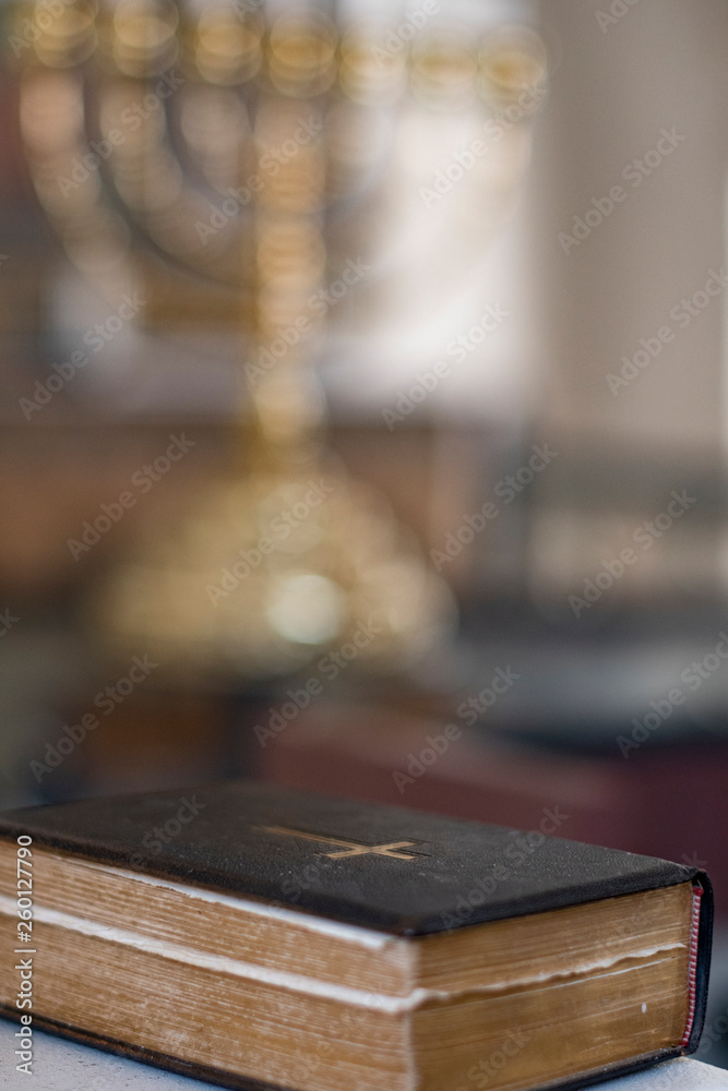 Holy Book laying in front i a Scandinavian church`s room Holy Book laying in front i a Scandinavian church`s room