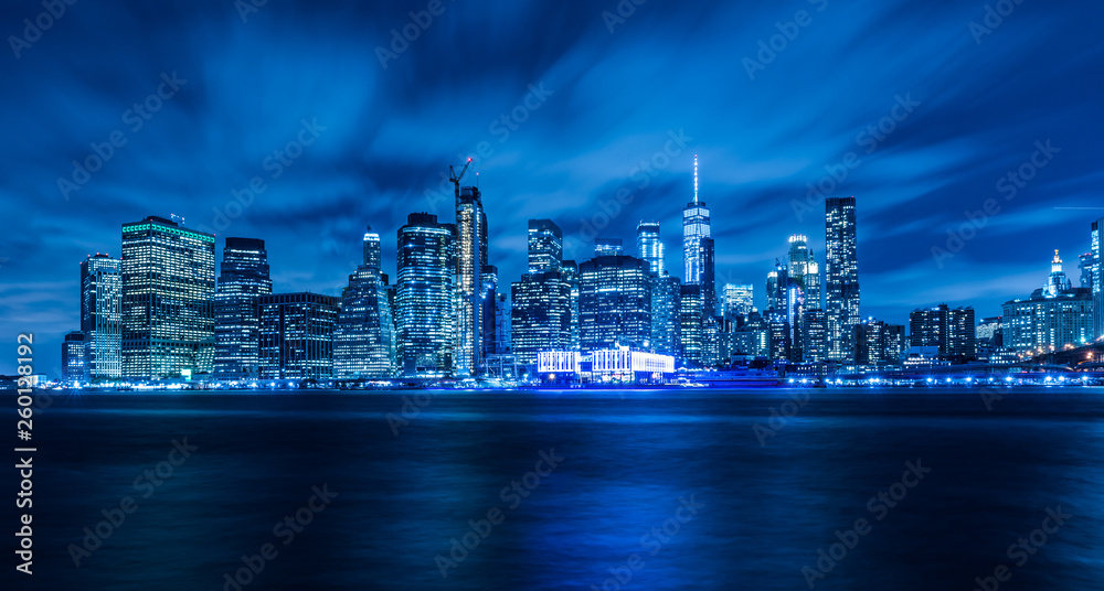 Manhattan panoramic skyline at night. Office buildings and skyscrapers. Manhattan, New York City, USA..