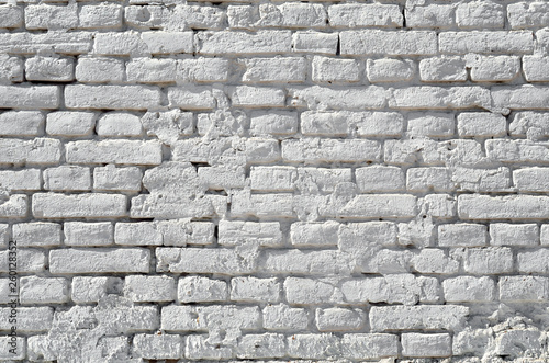 Texture of the wall of brick, painted white