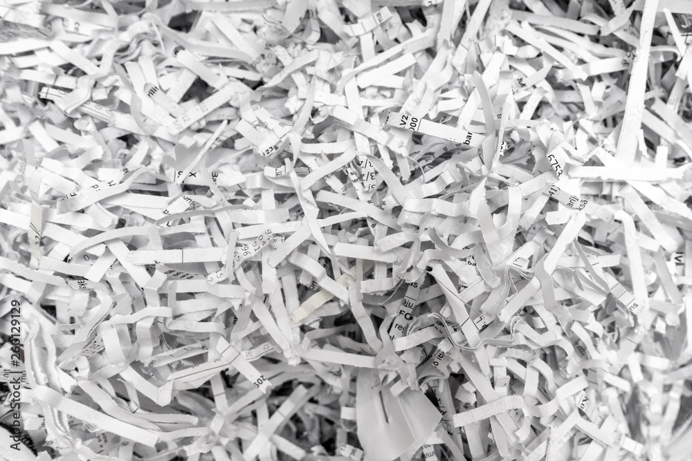 Shredded paper layer. White paper pattern. destruction of documents Shredded paper layer. White paper pattern. destruction of documents