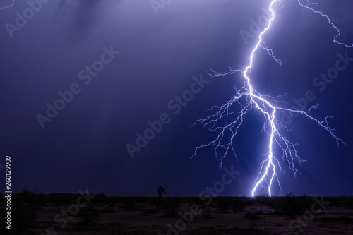 lightning strike and storm in the night sky