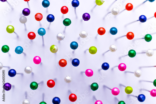 Sewing pins. Colorful sewing pins background. Close Up of sewing pins with multi colored heads. Part of set.