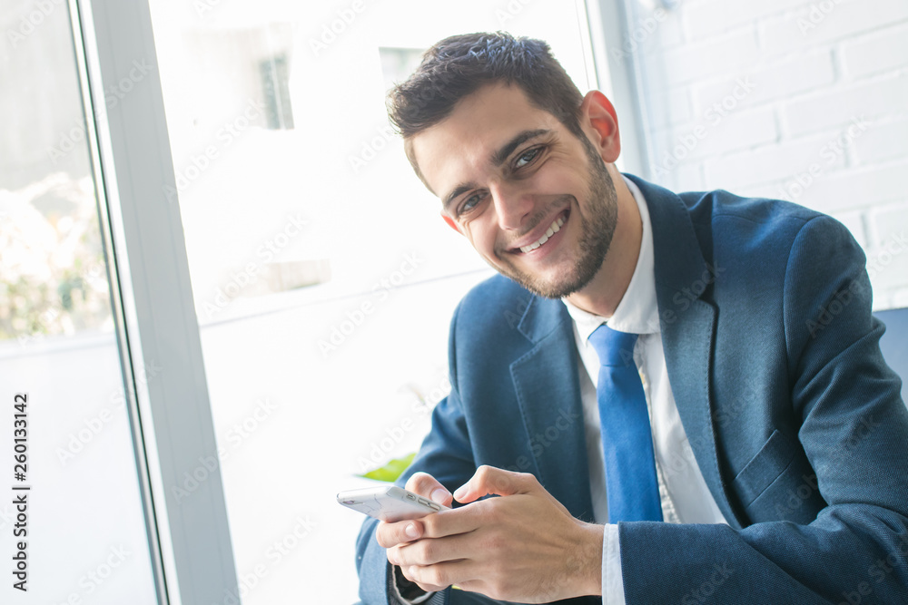 attractive business man with mobile phone attractive business man with mobile phone