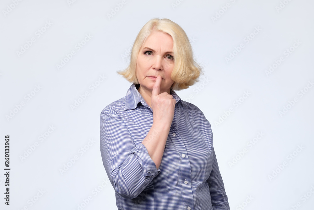 senior woman smirking thinking trying create plan in mind senior woman smirking thinking trying create plan in mind