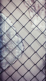 black metal grid on concrete wall background