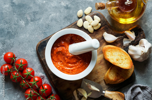 Romesco sauce, typical from Catalonia, Spain. Prepared with nora peppers, almonds, hazelnuts, garlic and tomato. photo