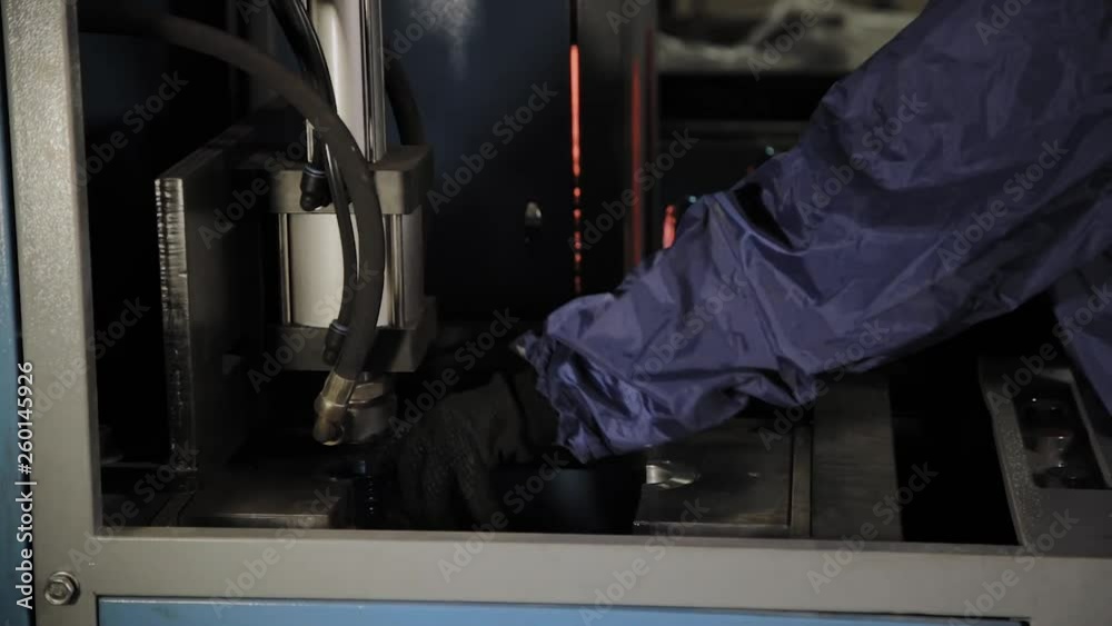 The work of the machine for blowing plastic bottles for drinking water. The work of the machine for blowing plastic bottles for drinking water.