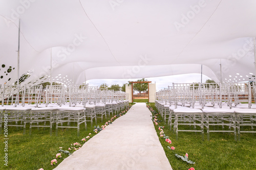 Outside wedding venue with white wedding tent