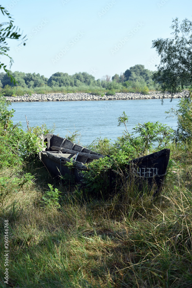 Old wooden abandoned boat. Danube Delta, Romania. Old wooden abandoned boat. Danube Delta, Romania.
