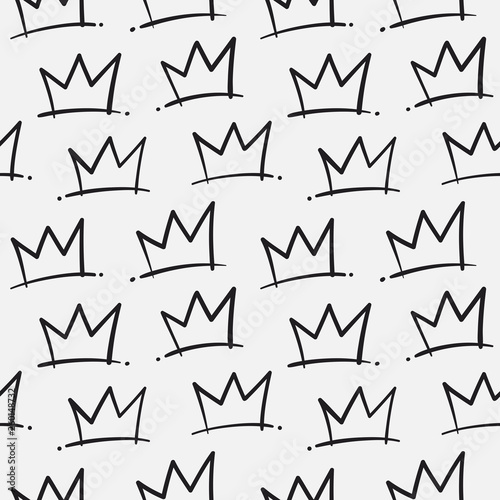 Seamless vector pattern with hand drawn crown illustration. Decorative background for print, textile, packaging, wrapping, greeting cards, or web. Creative graffiti style texture in black and white.