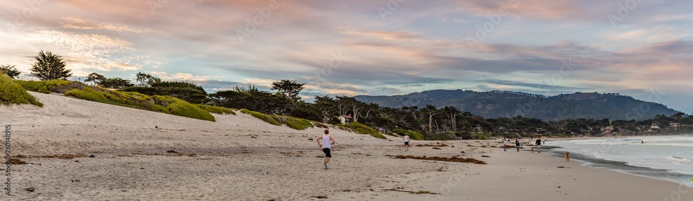 Panorama of a Jogger on the beach at Carmel Cove