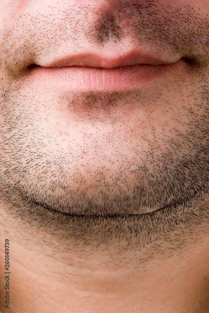 CLose-up of a man's mouth and chin CLose-up of a man's mouth and chin