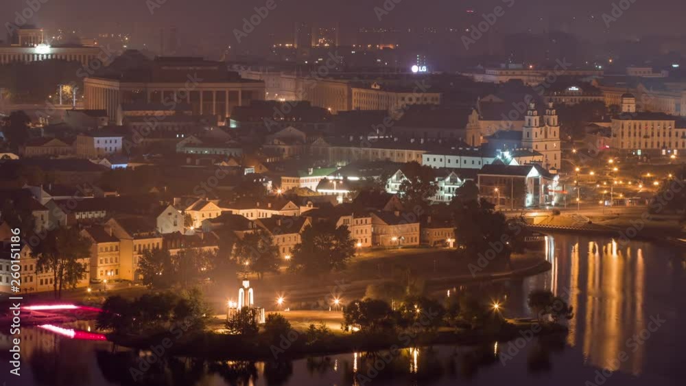 Night view of Minsk city, Belarus. Nemiga street, panorama of center cityscape residential and business buildings, old town and church. Night illumination Night view of Minsk city, Belarus. Nemiga street, panorama of center cityscape residential and business buildings, old town and church. Night illumination