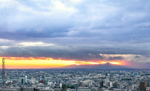 Nagoya cityscape in the evening with cloudy sky before heavy rain