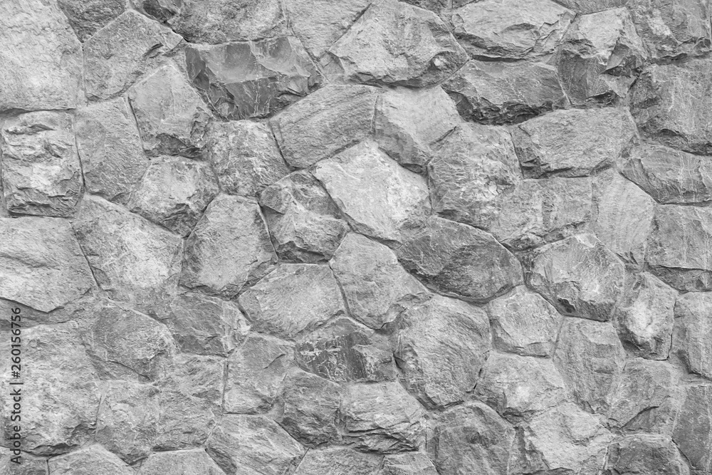 Gray stone wall as a background or texture. Gray stone wall as a background or texture.