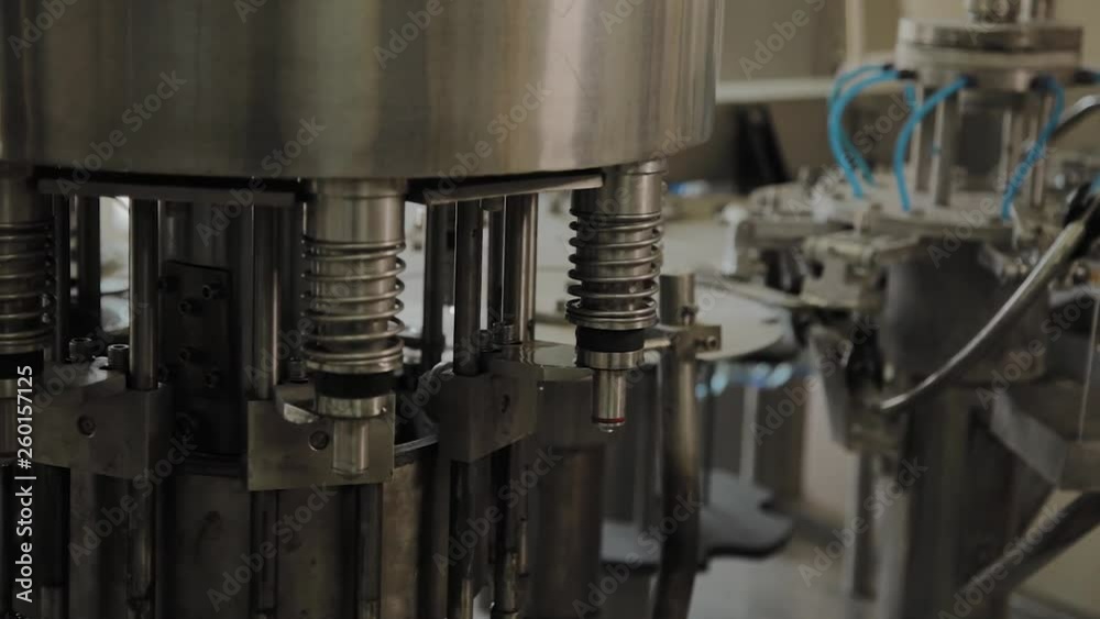 A stopped conveyor for bottling drinking water. Conveyor parts.