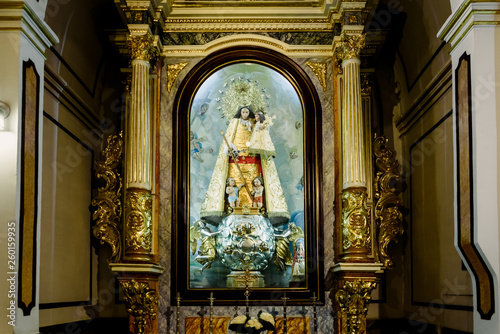Valencia, Spain - March 30, 2019: Sculpture of the Virgen de los Desamparados, inside a chapel in the church of La Fonteta de Valencia.