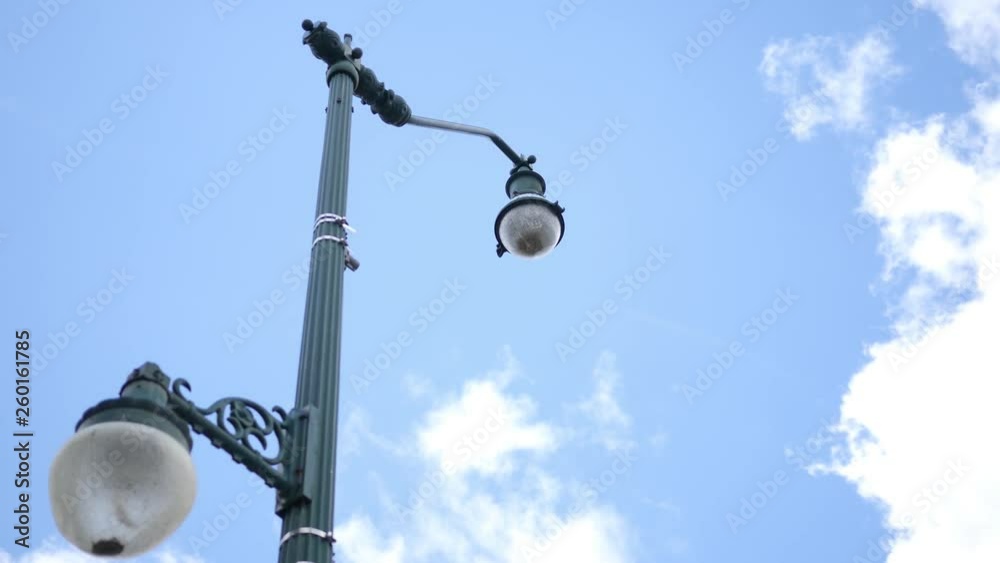 Time-lapse over Green Street Lamp with clouds passing overhead