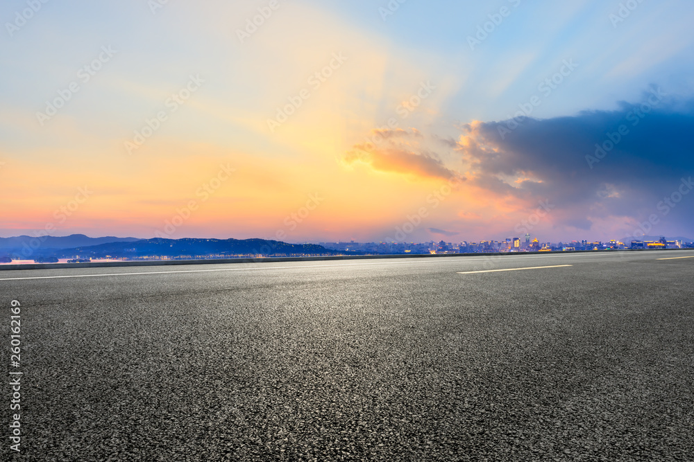 Asphalt highway passing through the city above in Hangzhou at sunset