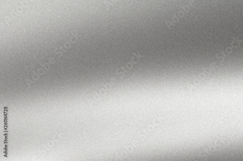 Abstract texture background, light shining on rough silver metal wall