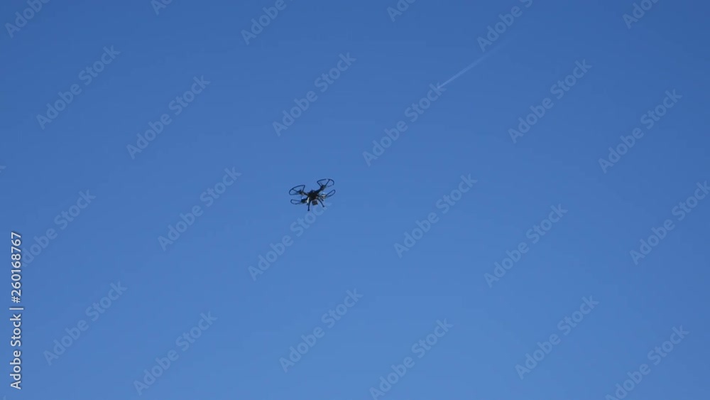 A drone flying in the sky. A drone flying in the sky.