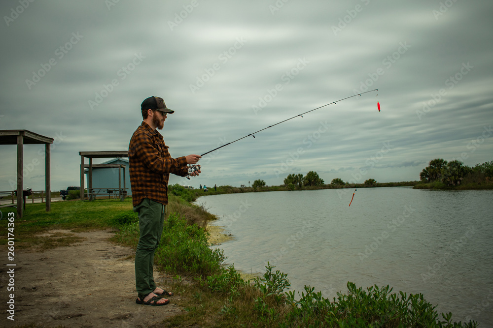 Fisherman In Action Standing Up Casting Fisherman In Action Standing Up Casting