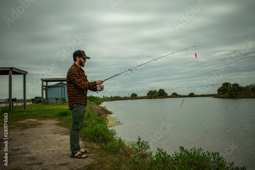 Fisherman In Action Standing Up Casting