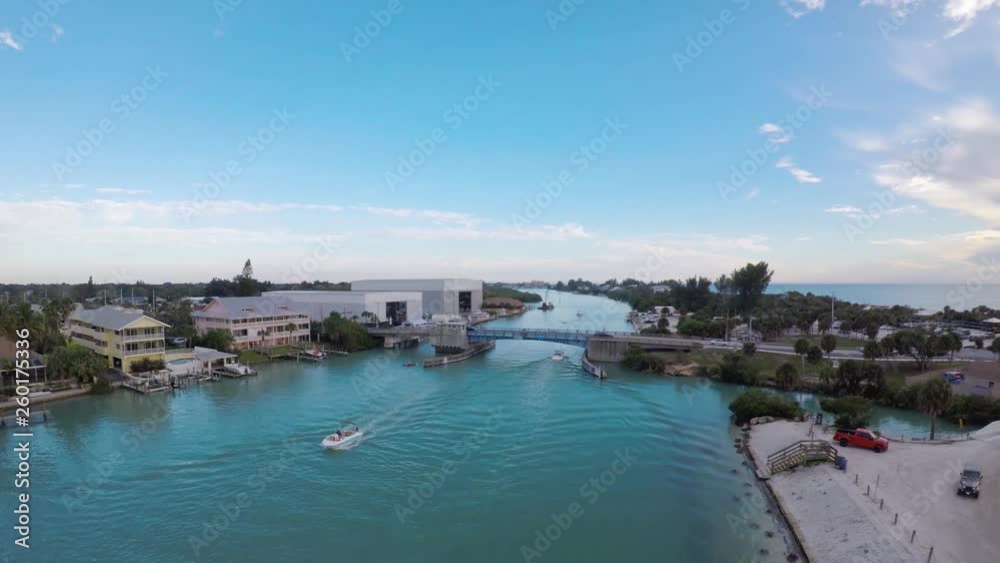 Aerial Forward Dolly of Boats Cruising Thru the Bay in Nokomis Beach and Approaching Drawbridge Aerial Forward Dolly of Boats Cruising Thru the Bay in Nokomis Beach and Approaching Drawbridge