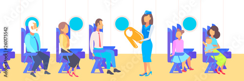 stewardess presenting how to use life vest to airplane passengers attendant girl in uniform safety concept modern plane board interior flat horizontal full length