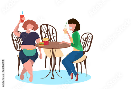 thin and fat women drinking juice and eating fast food during meeting unhealthy lifestyle concept girls sitting cafe table female cartoon characters full length flat horizontal