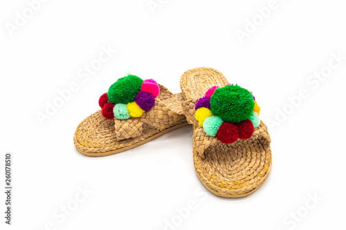 Sandals shoes handicraft made by water hyacinth on white background.