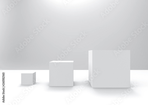 3d rendering. simple white square cube box from small to big row on gray background.