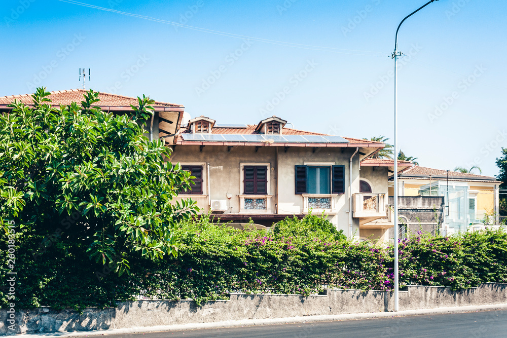Traditional architecture of Sicily in Italy, historical street of Catania, facade of old buildings. Traditional architecture of Sicily in Italy, historical street of Catania, facade of old buildings.